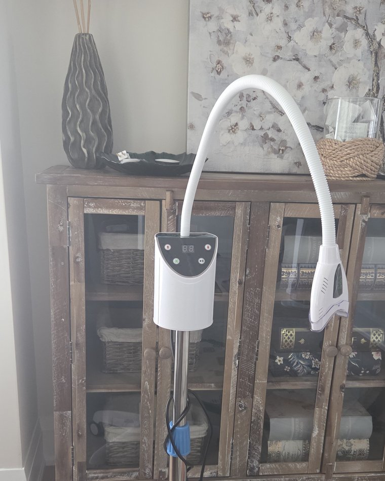 The LED lamp set up on a cabinet in a client's home